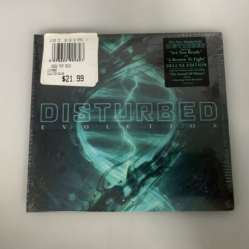 Новая версия нераспечатанного CD альбома Metal Riot-группы Disturbed Evolution Изображение 1