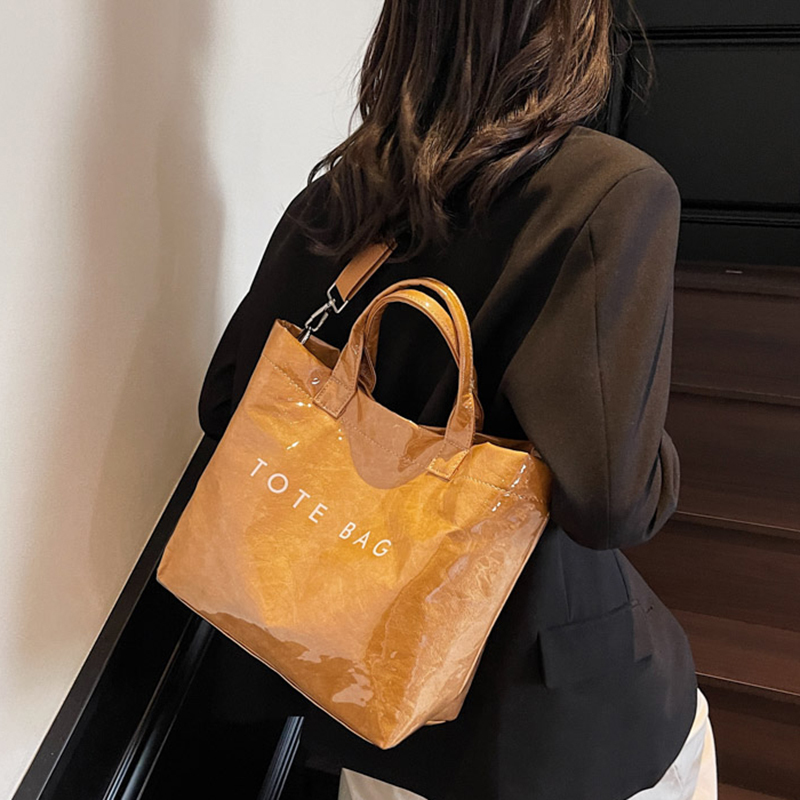 Large-Capacity Kraft Paper Jelly Bag 2026 New Transparent Waterproof Tote Bag for Work and Commuting Crossbody Tote Bag Large-Capacity Kraft Paper Jelly Bag 2026 New Transparent Waterproof Tote Bag for Work and Commuting Crossbody Tote Bag