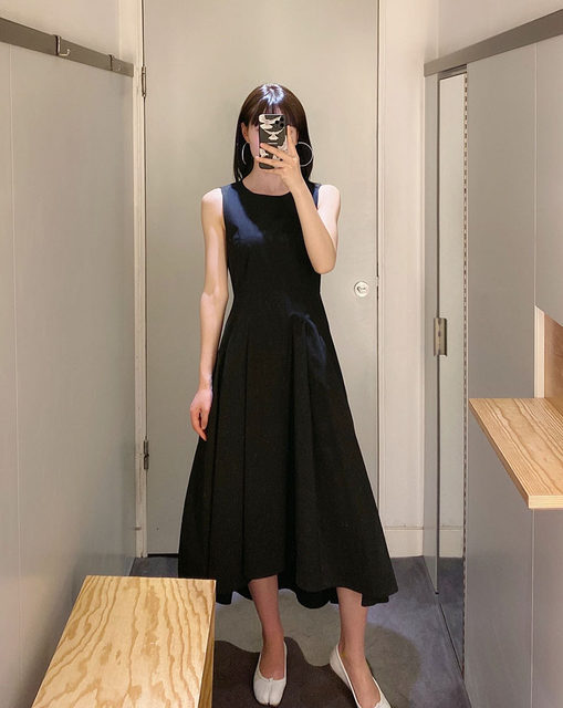 Minimalist cos style black waisted sleeveless round neck short front and long back 23 summer new women's dress domestic purchasing agency