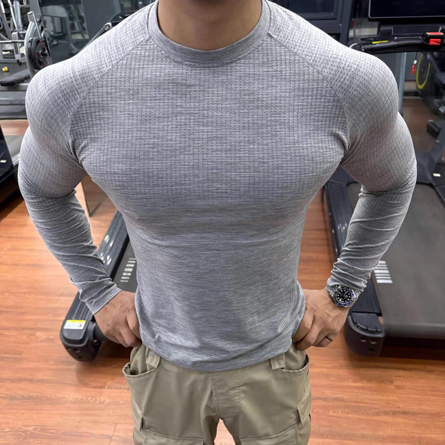 Seamless jacquard fitness long-sleeved T-shirt sports outdoor men's slim-fit quick-drying elastic training top round neck