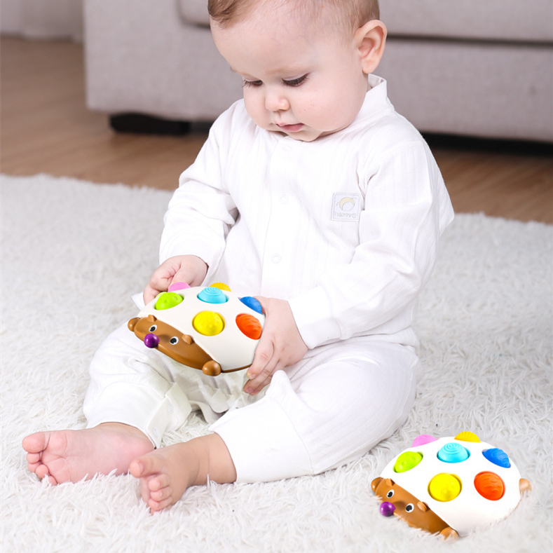 Baby finger pressing on hand fine action gripping training Hedgehog Bubble 0-1-year-old baby soothing toy