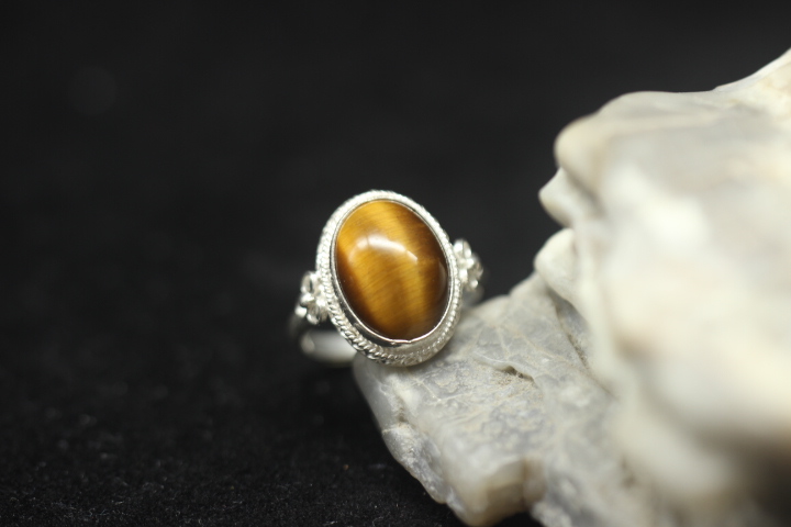 Decades of silver opal tiger eye stone ring craftsmanship is good