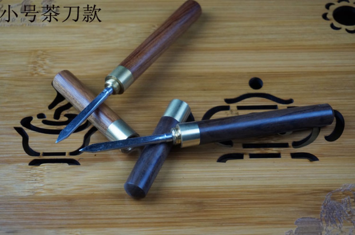 Kung Fu bộ trà đạo cung cấp phụ kiện trà mun dao trà kim gỗ đặc biệt Pu-erh trà dao trà không gỉ bình pha trà có lưới lọc inox