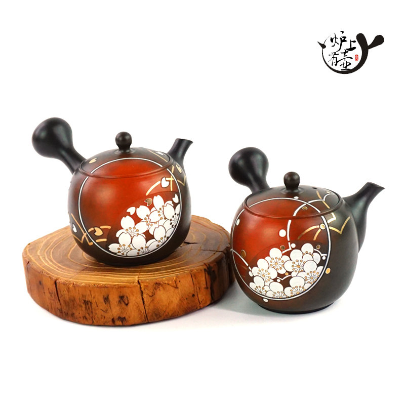 Japan's imported Tokoname ware Morishita Tsunade made cherry blossoms and plum blossoms with golden carvings on the side of rushing teapots in wooden boxes