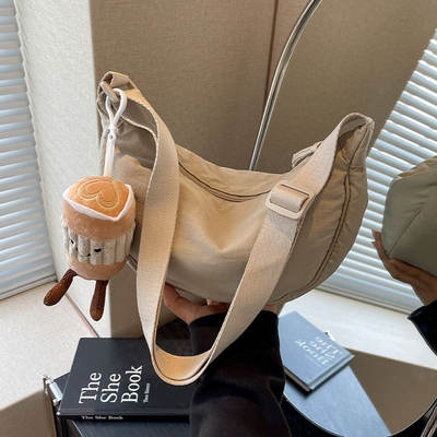 Solid color casual crossbody dumpling bag for women 2026 new style single-shoulder canvas bag, simple and lightweight, student crossbody small bag