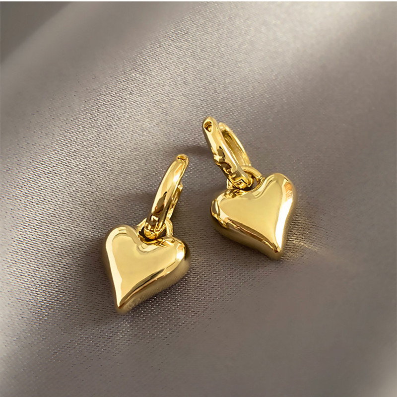 Heart-to-heart ~ high-end earrings love earrings women's golden peach heart earrings simple niche design earbuds