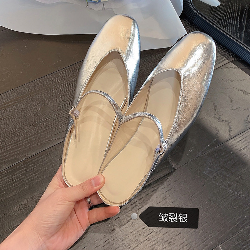 A D Hepburn~French character with silver Muller shoes and female wear cool drags