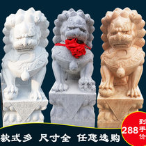 A pair of stone lions watch the door of the town house household courtyard doorway lucky stone carving little lion bluestone cemetery Feng Shui ornaments