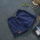 Quần 3 nam mùa hè đi biển cặp đôi quần short nam nhà thể dục siêu 5 điểm quần short chạy thể thao quần nóng