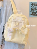 Кремово-желтая труба (с подвеской в клетку) [Значок «Бесплатный эльф»]