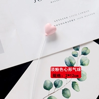 Розовый воздушный шар в форме сердца