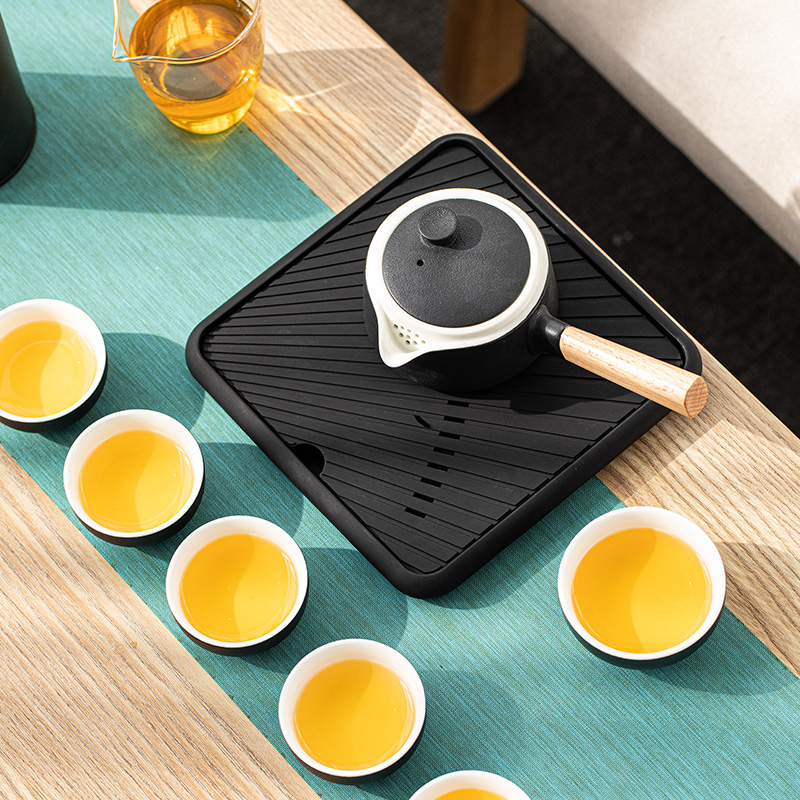 The professor of Chinese black ceramic side put The pot of kung fu tea set suit household contracted water storage of a complete set of type dry tea tray