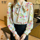 Long-sleeved chiffon floral bow tie French texture temperament shirt female design sense niche early autumn small Hong Kong taste