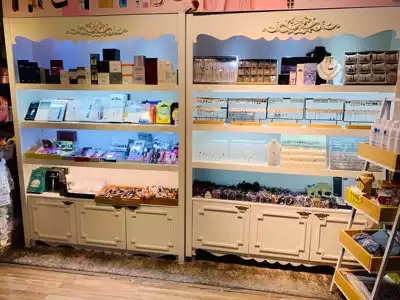 Paint cosmetics cabinet Beauty salon Modern product display rack Skin care product display cabinet Multi-layer commercial container