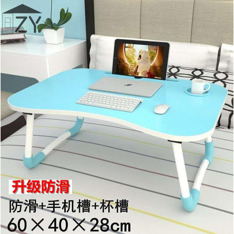 A desk that can be placed on a bed for home use can be folded to sit and write for primary school students Multi-functional Zhuo Zi is placed in a mini