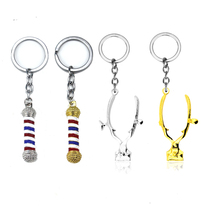 Cross-border explosive dripping Barber turning light tool barber shop retro push knife logo Keychain Car pendant