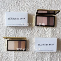 Spotted Victoria Beckham Bessao's colorful eye disc tuxedo lipstick spice pose