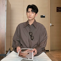 Темно коричневый