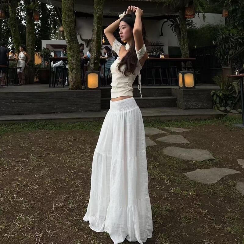 Designed with a French Niche Style, the White Skirt Has an Elegant and Flowing Silhouette, a Long Train That Reaches the Floor, and a Super Fairy-Like Vibe with a Holiday Feel