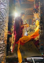 The seven-petal lotus flower is enshrined in Jokhang Temple in Lhasa Tibet and is worshiped by brushing gold praying for blessings lighting lights making wishes etc