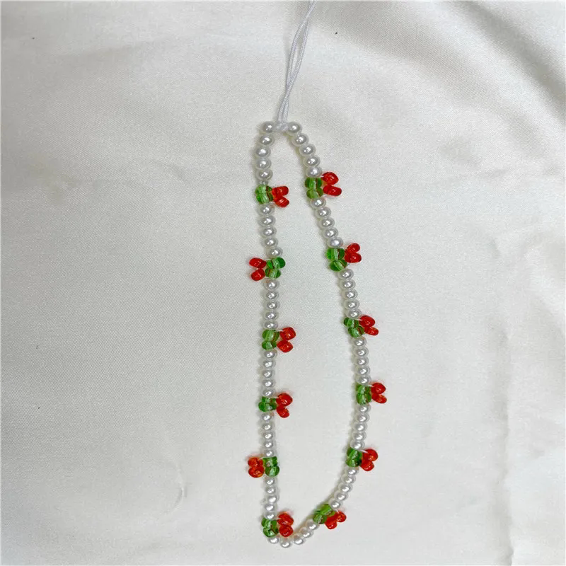 Ins Niche Solid Color Rice Bead Cherry Chain Phone Case Universal New Model Ccd Camera Pendant Versatile Bag Anti-Loss