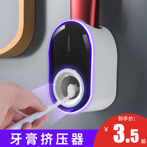 Fully automatic squeezing toothpaste artifact set wall-mounted toothbrush toothpaste rack non-punching squeezer children
