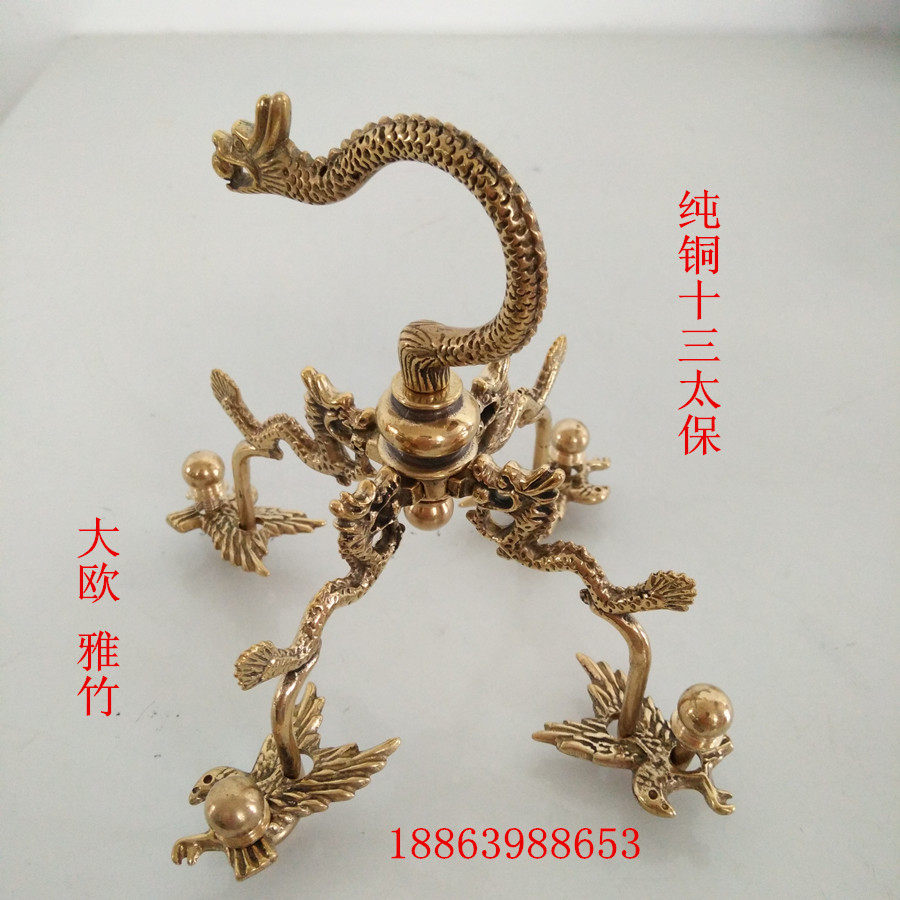 The Pepling Painting Brow Red Son Indie Bird Cage with a boutique dragon-shaped four-claw hook