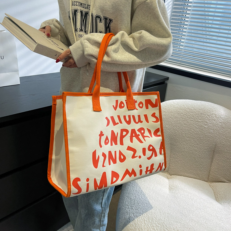 Portable mommy bag mother and baby bag go out lightweight canvas bag 2022 new fashion baby mother with baby storage bag