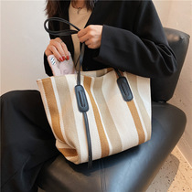 Mommy bag 2022 new fashion handbag bag single shoulder large capacity canvas bag out to receive Natot bag