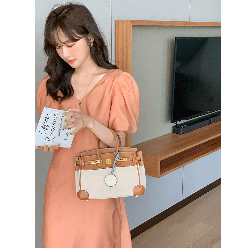Hepburn-Style V-Neck Dress for Women, 2026 Summer New French Long Dress, Slimming Orange Color, Elegant Puff Sleeves