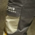 Quần yếm màu xám dành cho nam thương hiệu quần ống rộng phiên bản Hàn Quốc của xu hướng quần âu Nhật Bản tương phản màu khâu quần harem - 3/4 Jeans
