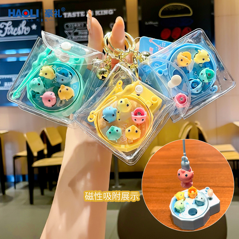 Fishing-Themed Magnetic Wind-Up Spinning Handheld Fishing Reel Cartoon Figurine Keychain Baby Gift
