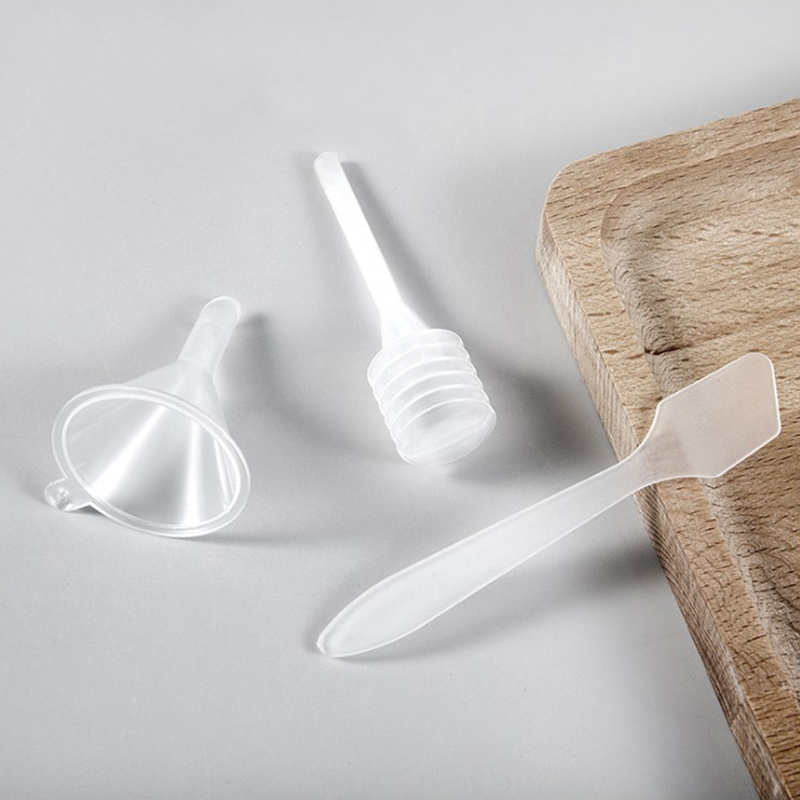 Cosmetic dispensing tool Small funnel Cream spoon Cream stick Mask tool Droplet tube measuring cup Bottle set