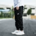 Yu Wenle quần nam hip hop ngụy trang quần dụng cụ phiên bản Hàn Quốc của xu hướng chân nhỏ buông lơi chân váy Harlan giản dị quần baggy nam Quần Harem
