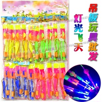 Childrens toys luminous flying arrow rubber band catapult small flying arrow flying fairy school surrounding hanging board toy wholesale