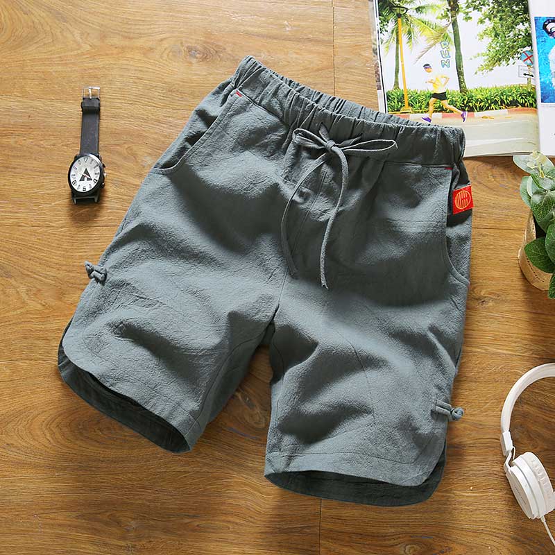 Tide nam lanh mùa hè nửa phần quần bãi biển bình thường lăm điểm trong mỏng nửa cắt quần short bé trai quần cotton