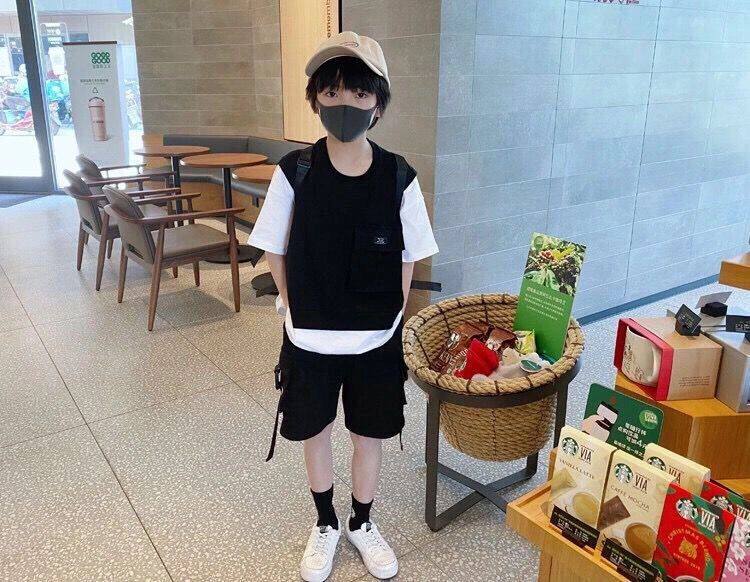 Boys' 2022 summer clothes new medium and big boys fake two-piece short-sleeved T-shirt tooling five-point shorts Western style suit tide