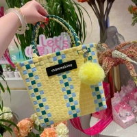 Средняя плетеная ручка лимонно-желтого цвета. Соберите и купите бесплатный кулон в виде шарика для волос.