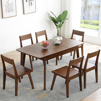Retractable solid wood dining table and chairs combined modern minima Nordic small family home day type rectangular dining table