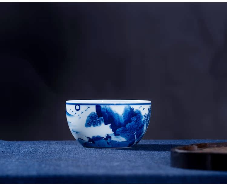 Jingdezhen blue and white landscape pure manual hand - made master cup sample tea cup noggin single CPU kung fu tea set with a gift