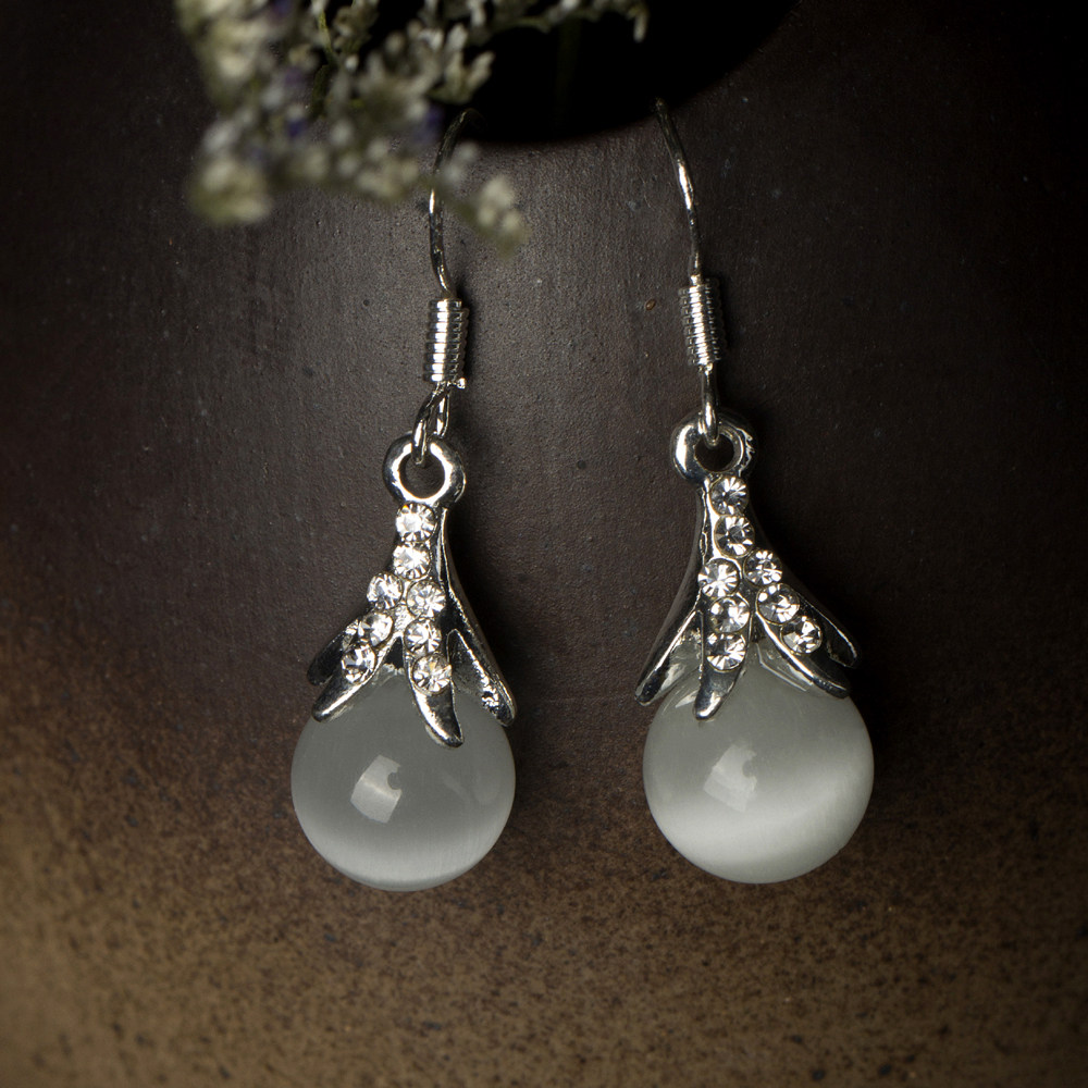 Xiranxuan s925 sterling silver opal crystal small ball earrings women's long Korean sweet temperament earrings are versatile