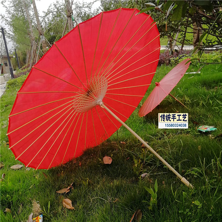 Chinese style new craft big red decorative umbrella oversized oil paper umbrella silk fabric dance umbrella solid version