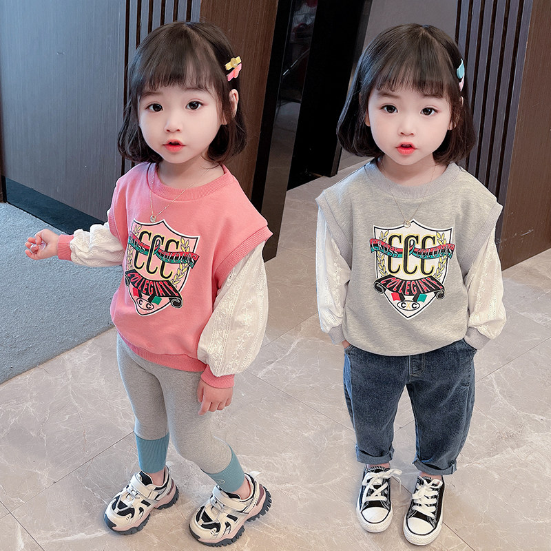 Girls' spring clothes cartoon stitching lace puff sleeves fake two-piece sweater female baby Western style casual Korean style inner wear