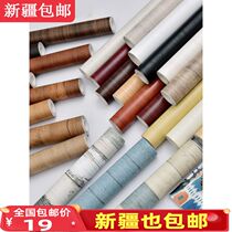 Xinjiang self-adhesive wallpaper imitation wood grain stickers Furniture renovation wallpaper bedroom wardrobe sub-desktop wooden door stickers