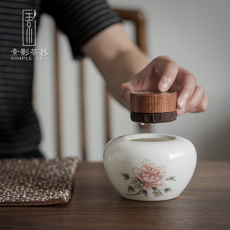 Plain film hand - made ceramic tea pot small portable portable sealed as cans household white porcelain tea pot storage tanks