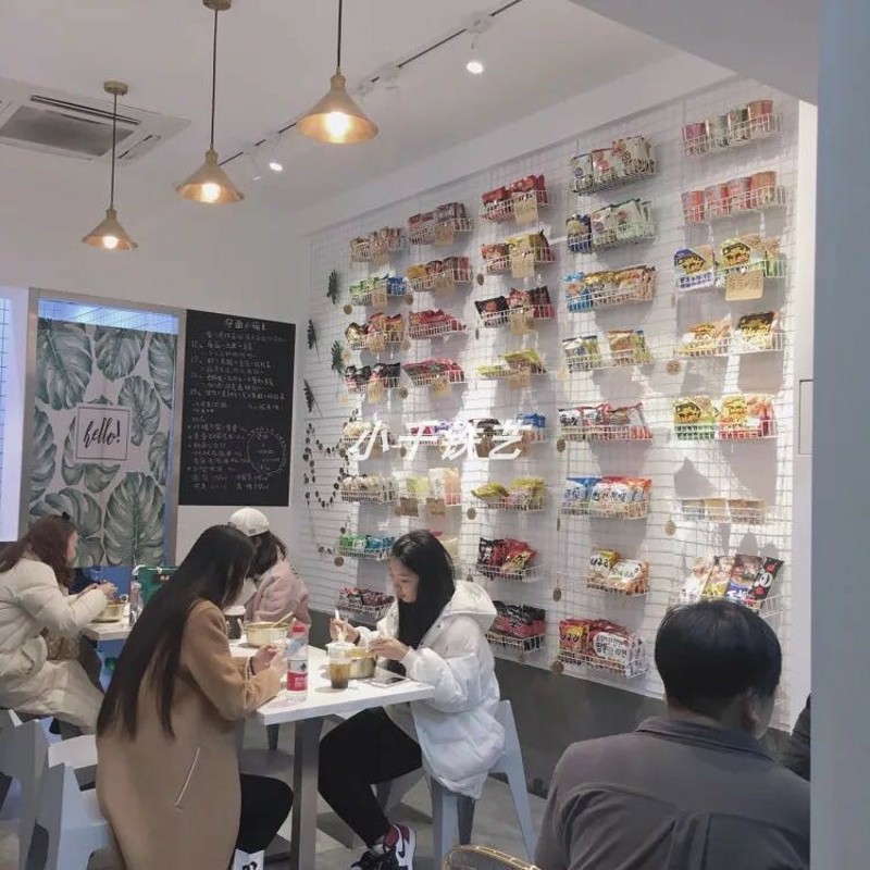 Supermarket canteen snack wall merchandise rack stall black and white iron grid net red instant noodles canteen decorative wall