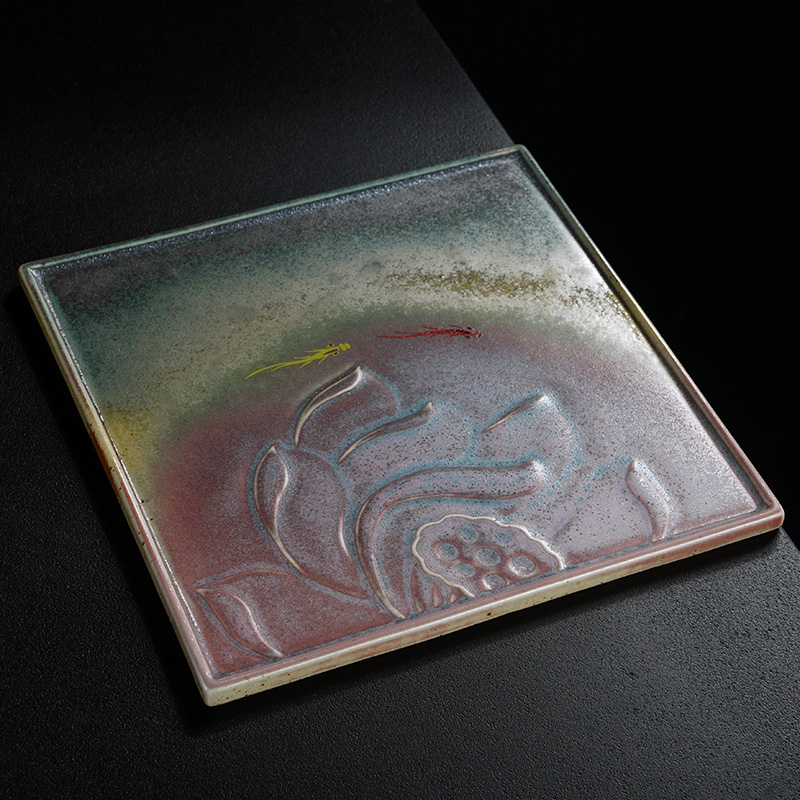 Old ceramic up saucer at the grid plate of Japanese zen tea tray was restoring ancient ways of household dry plate bearing tea pot heart plate