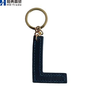 Hengdian Rattan Letter Keychain ຫນັງແທ້ Pendant ເຄື່ອງປະດັບສ້າງສັນຂອງຂວັນສໍາລັບຄູ່ຜົວເມຍແລະຫມູ່ເພື່ອນທີ່ດີທີ່ສຸດ