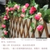 Qingya retro mô phỏng hoa hồng mây hoa giả mây nhựa lụa hoa điều hòa không khí trang trí ống hoa treo tường nho - Hoa nhân tạo / Cây / Trái cây