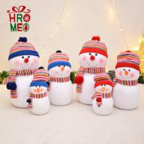 Hromeo snowmans family of three dolls Christmas decorations Hotel window Christmas decorations